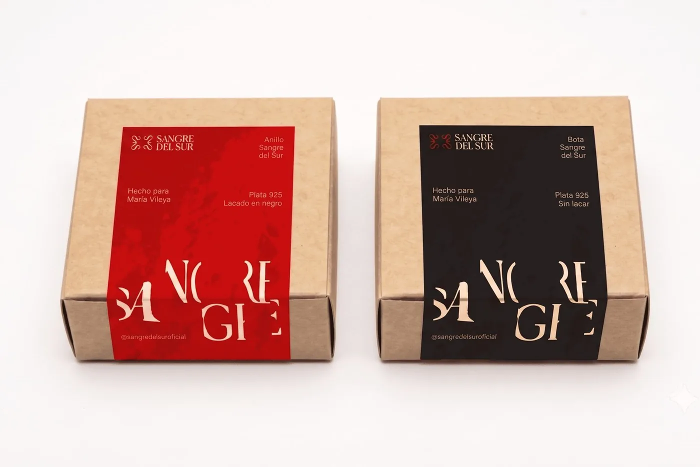 Packaging de Sangre del Sur: dos cajas de cartón kraft con etiqueta roja y negra